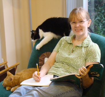 Marianne Dyson at home with cats.